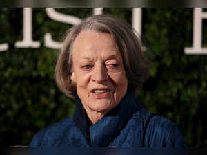 FILE PHOTO: British actress Maggie Smith poses for photographers at the Evening Standard British Film Awards in London, Britain