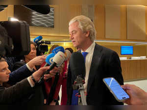 FILE PHOTO: Dutch far-right leader Geert Wilders speaks to media in The Hague