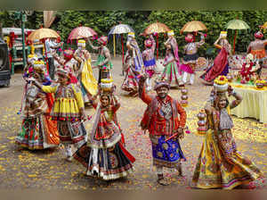 Ahmedabad: Performers dressed in traditional attire rehearse for Garba, a tradit...