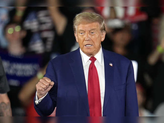 Trump lists his grievances in a Wisconsin speech intended to link Harris to illegal immigration