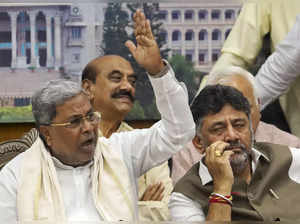 Bengaluru: Karnataka Chief Minsiter Siddaramaiah with his Deputy DK Shivakumar a...