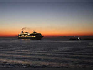 A cruise ship arrives at Limassol port after evacuating people from Haifa in Israel, in Limassol