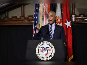 Former President Barack Obama speaks to guests after receiving the 2024 Sylvanus...