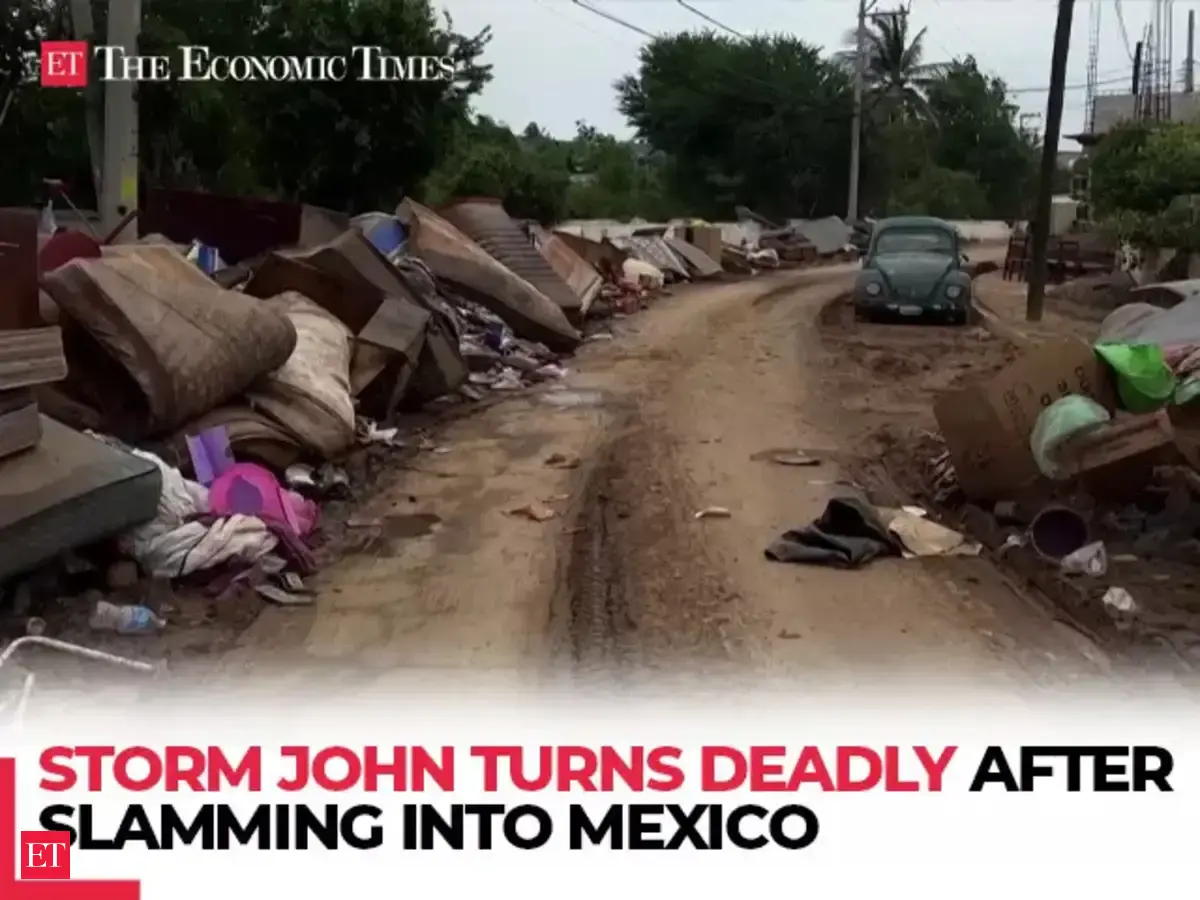 US: Tropical Storm John leaves homes and roads in ruins at beach resort ...