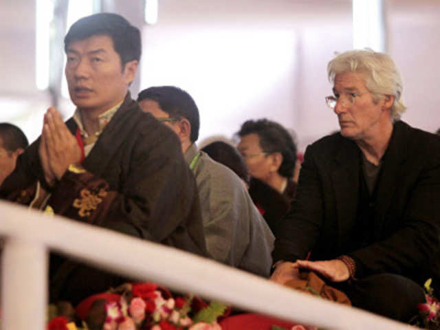 Richard Gere attends a teaching session Dalai Lama