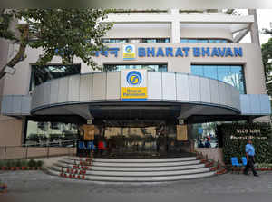 A private security guard stands in front of the regional head office of oil refiner Bharat Petroleum Corp in Kolkata