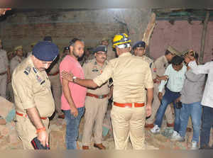 Bareilly: Police personnel conduct investigation after a blast at a firecracker ...