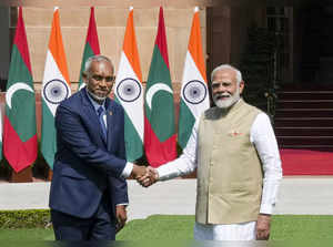 New Delhi: Prime Minister Narendra Modi shakes hands with Maldives President Moh...