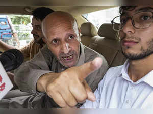 New Delhi: MP Engineer Rashid leaves after he was released from Tihar Jail, in N...