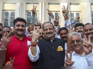 Jammu: BJP candidate Devender Singh Rana with supporters after winning the Jammu...