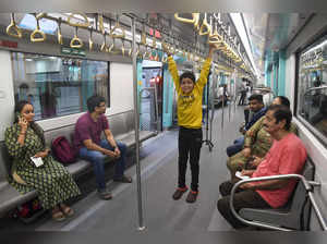 Mumbai: People ride a metro on the Bandra Kurla Complex (BKC) to Aarey undergrou...