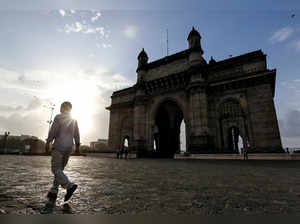 FILE PHOTO: FILE PHOTO: People visit Gateway of India along the Arabian sea in Mumbai