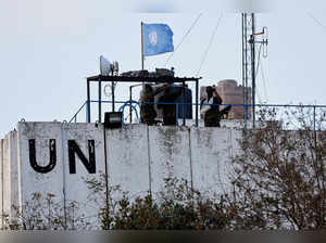 FILE PHOTO: United Nations peacekeepers (UNIFIL) look at the Lebanese-Israeli border