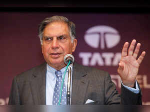 FILE PHOTO: Ratan Tata gestures during the annual general meeting of Tata Steel Ltd., in Mumbai