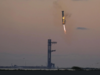 SpaceX's towering 400 ft Starship rocket successfully caught by mechanical arms