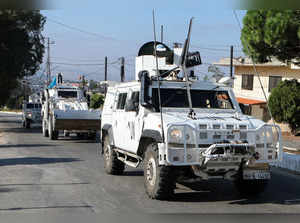 UN peacekeepers (UNIFIL) vehicles drive in Marjayoun