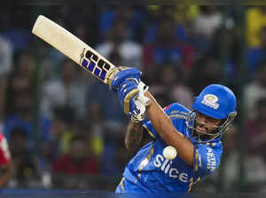 New Delhi: Mumbai Indians batter Tilak Varma plays a shot during the Indian Prem...