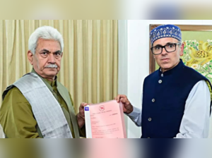 Omar Abdullah with LG Manoj Sinha.