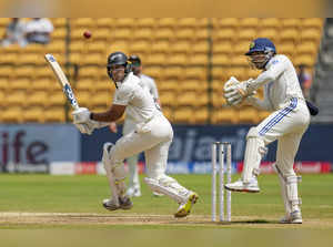 Bengaluru: New Zealand batter Rachin Ravindra plays a shot during the third day ...