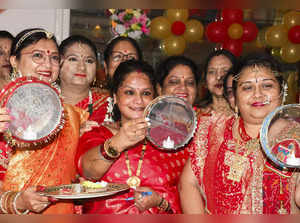 Bhopal: Women of Agrawal Mahila Mandal participate in a pre-Karva Chauth event, ...