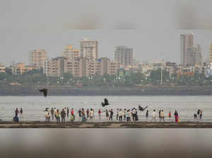 Mumbai: People visit Dadar beach, in Mumbai. (PTI Photo/Shashank Parade)(...