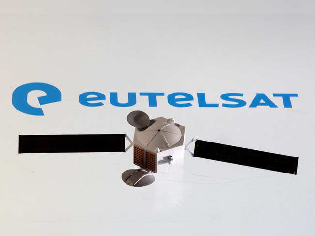 FILE PHOTO: Picture illustration of Eutelsat logo and satellite model