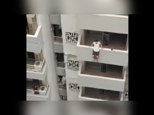 Man attempts to jump from high rise building, saved by alert residents