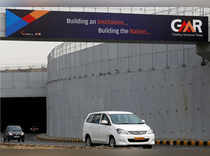  Vehicles cross through an underpass constructed by GMR Infrastructure that connects to the airport in New Delhi