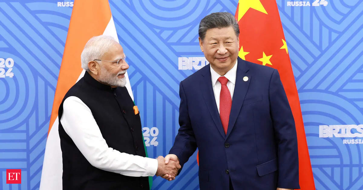 india china relations: A BRIC off the wall: PM Modi & Chinese prez Xi Jinping talk stability, endorse patrolling pact in 1st bilateral meet after 5 years