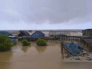 Bhadrak: View of a jetty ahead of cyclone 'Dana' landfall, at Dhamra in Bhadrak ...