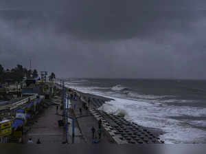 East Midnapore: Waves crash against the coast in view of cyclone 'Dana', which i...