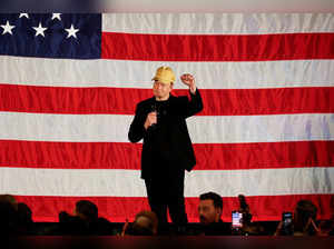 FILE PHOTO: Tesla CEO and X owner Elon Musk speaks about voting during an America PAC Town Hall, in Folsom