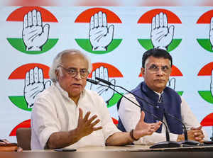 New Delhi: Congress leaders Jairam Ramesh and Pawan Khera address a press confer...