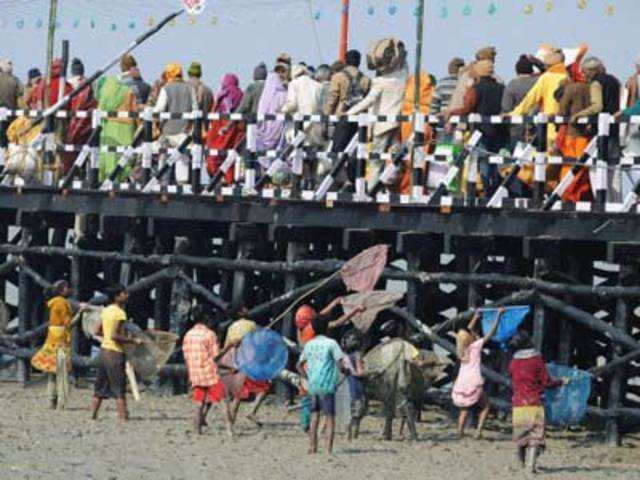 Pilgrims converging for Gangasagar Mela