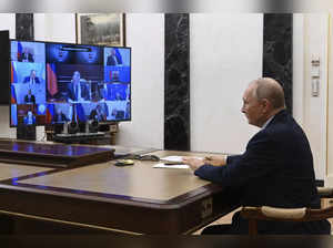 Russian President Vladimir Putin chairs the Security Council meeting via videoco...