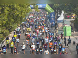 New Delhi: Participants during Vedanta Delhi Half Marathon 2024, in New Delhi. (...