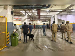 Lucknow: Bomb disposal squad inspects a hotel that received bomb threats via ema...