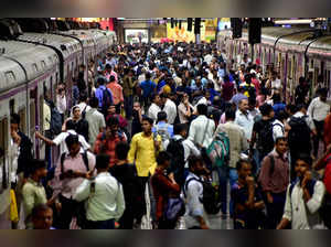 Mumbai: Commuters stranded at Chhatrapati Shivaji Terminus (CSMT) as local train...