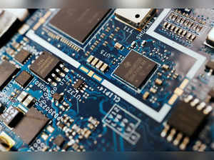 FILE PHOTO: Illustration picture of semiconductor chips on a circuit board