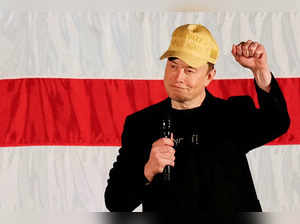 FILE PHOTO: Tesla CEO and X owner Elon Musk speaks about voting during an America PAC Town Hall, in Folsom