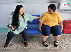 FILE PHOTO: Patients chat with each other at a weight loss centre in Changchun