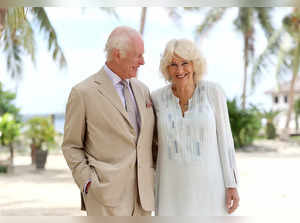 FILE PHOTO: King Charles and Queen Camilla pose for portrait on the beach in Samoa