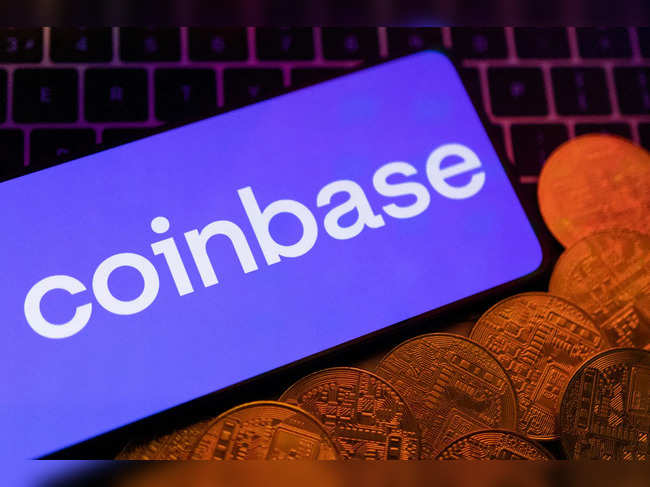 FILE PHOTO: Illustration shows smartphone with displayed Coinbase logo