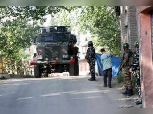 Kulgam, May 8 (ANI): Security personnel patrol after the encounter between secur...