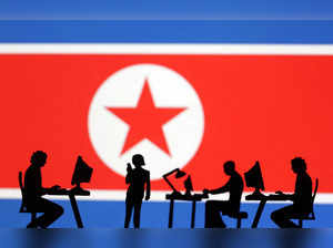 FILE PHOTO: Illustration shows miniatures and North Korea flag