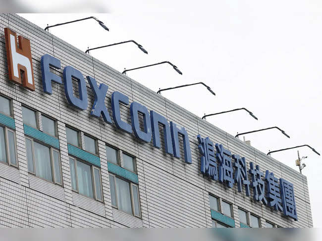 FILE PHOTO: The logo of Foxconn is pictured on top of the company's headquarters in New Taipei City