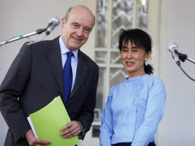 San Suu Kyi and France's Foreign Minister after their meeting