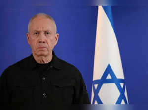 Former Israeli Defense Minister Yoav Gallant speaks to members of the press, in Tel Aviv