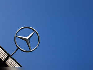 FILE PHOTO: The logo of Mercedes-Benz is seen outside a Mercedes-Benz car dealer in Brussels