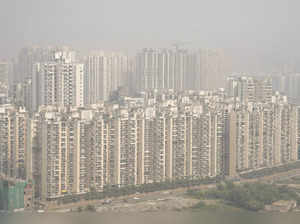 Greater Noida: High-rise buildings engulfed in a layer of smog, in Greater Noida...